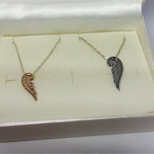 The kiss Japan brand Couple Gold tone and gunmetal Silver Wing Pendant Necklace